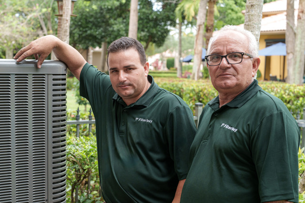 Best HVAC installation services company in Boynton Beach FL - A picture of Filterbuy HVAC technicians doing an HVAC installation service in Royal Boynton FL