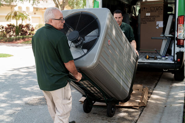 Best HVAC installation services company in Coral Gables FL - A picture of Filterbuy HVAC technicians doing an HVAC installation service in Coral Gables FL