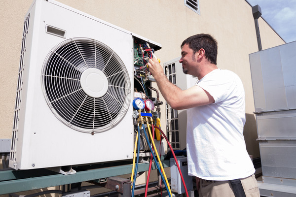 Best HVAC replacement services company in Tamarac FL - A picture of Filterbuy HVAC technician doing an HVAC replacement service in Tamarac FL