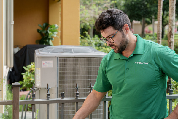 Best HVAC installation services company in Royal Palm Beach FL - A picture of Filterbuy HVAC technician doing an HVAC installation service in Royal Palm Beach FL